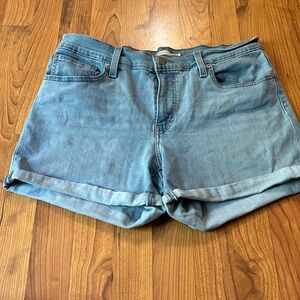 Levi mid length women shorts.